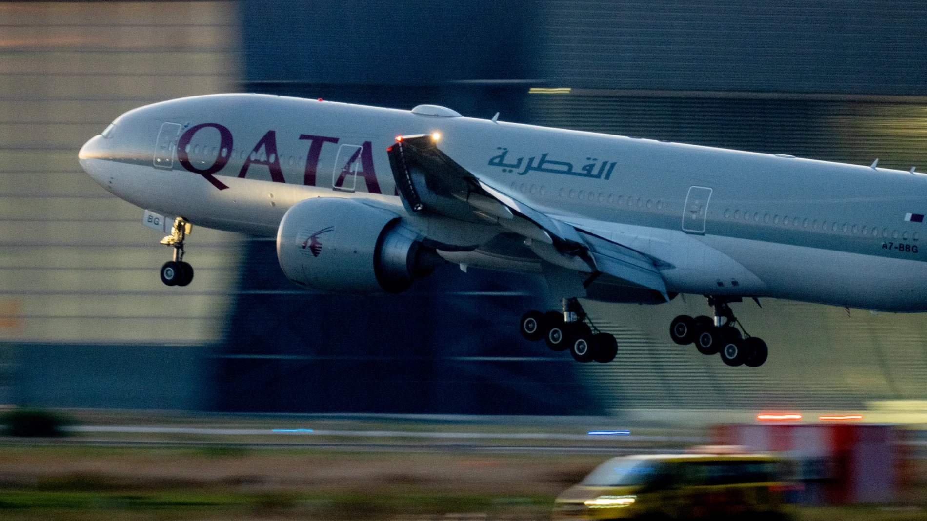 FILE - A Qatar airways plane lands at the airport in Frankfurt, Germany, as the sun rises on Sept. 25, 2023. Twelve people were injured when a Qatar Airways plane flying from Doha to Dublin on Sunday May 26, 2024 hit turbulence, airport authorities said. (AP Photo/Michael Probst, File)