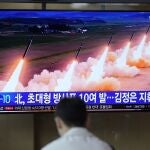 A TV screen shows a report of North Korea's multiple rocket launchers during a news program at the Seoul Railway Station in Seoul, South Korea, Friday, May 31, 2024.