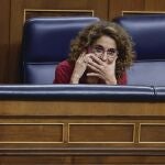 La vicepresidenta primera y ministra de Hacienda, María Jesús Montero, este martes en el Pleno del Congreso de los Diputados. 