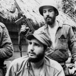  Fidel Castro, the young anti-Batista guerrilla leader, center, is seen with his brother Raul Castro, left, and Camilo Cienfuegos, right, while operating in the Mountains of Eastern Cuba.