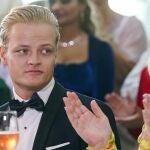 Marius Borg Hoiby (L) and Norwegian Crown Princess Mette-Marit attend a government's party event in Oslo, Norway