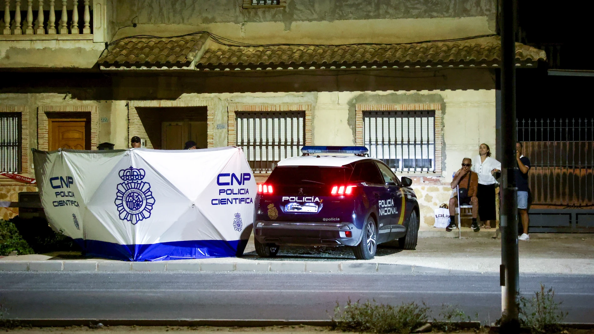 MURCIA, 15/08/2024.- Una mujer de 90 años de edad ha sido asesinada este jueves tarde en la pedanía de Puente Tocinos (Murcia), apuñalada supuestamente en el transcurso de una riña familiar, por causas desconocidas. El agresor, ha huido y ha sido detenido posteriormente en su domicilio, a unos 300 metros del lugar de la agresión. EFE/Juan Carlos Caval