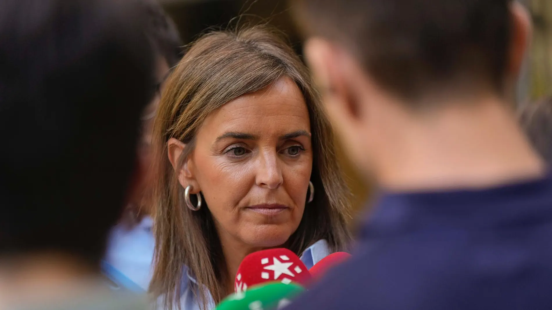 La vicesecretaria de organización del PP, Carmen Fúnez, a las puertas de la sede nacional del partido.