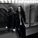 Singer Cher poses for a photo taken by singer Bryan Adams for the 2022 Pirelli Calendar called "On The Road" .