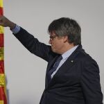 Catalan independence leader and former President Carles Puigdemont addresses supporters after his arrival near the Catalan parliament to attend the investiture debate in Barcelona, Spain, Thursday Aug. 8, 2024. Puigdemont, the former leader of Catalonia who left Spain after organizing an independence referendum in the Spanish northeastern region seven years ago, announced that he plans to return home on Thursday despite the likelihood of being arrested on his return. (AP Photo/Joan Mateu)