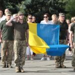 Run with Ukrainian flag in Kiev