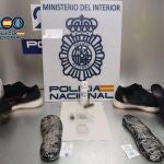 MADRID.-Sucesos.- 5 detenidos en el aeropuerto de Barajas por ocultar más de 3 kg de cocaína en las suelas de sus zapatillas