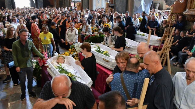 Ukraine bids farewell to mother and daughters killed in Russian strike on Lviv