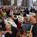 Ukraine bids farewell to mother and daughters killed in Russian strike on Lviv