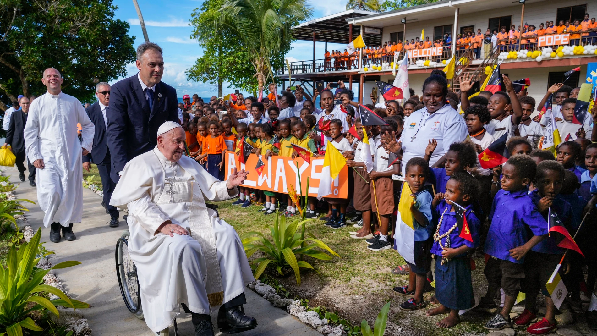 Pope Francis arrives at the Holy Trinity Humanistic School in Baro, near Vanimo, Papua New Guinea, Sunday, Sept. 8, 2024. Pope Francis celebrated the Catholic Church of the peripheries on Sunday as he traveled to the remote jungles of Papua New Guinea, bringing with him a ton of medicine and toys and a message of love overcoming violence for the people who live there.(AP Photo/Gregorio Borgia)