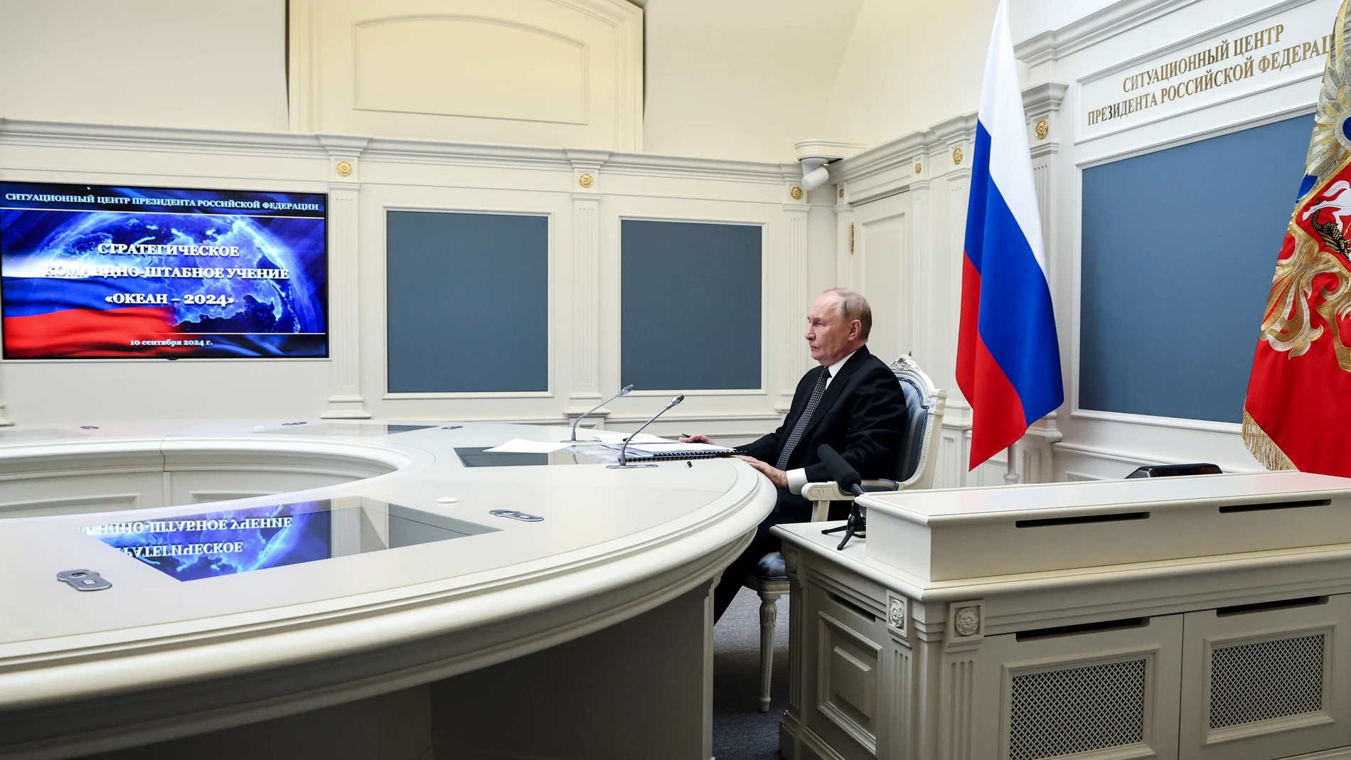 Russian President Vladimir Putin takes part in the beginning of the active phase of the large scale naval exercise as the Ocean-2024 drills via videoconference from the control center in the Kremlin in Moscow, Russia, Tuesday, Sept. 10, 2024. (Alexander Kazakov, Sputnik, Kremlin Pool Photo via AP)
