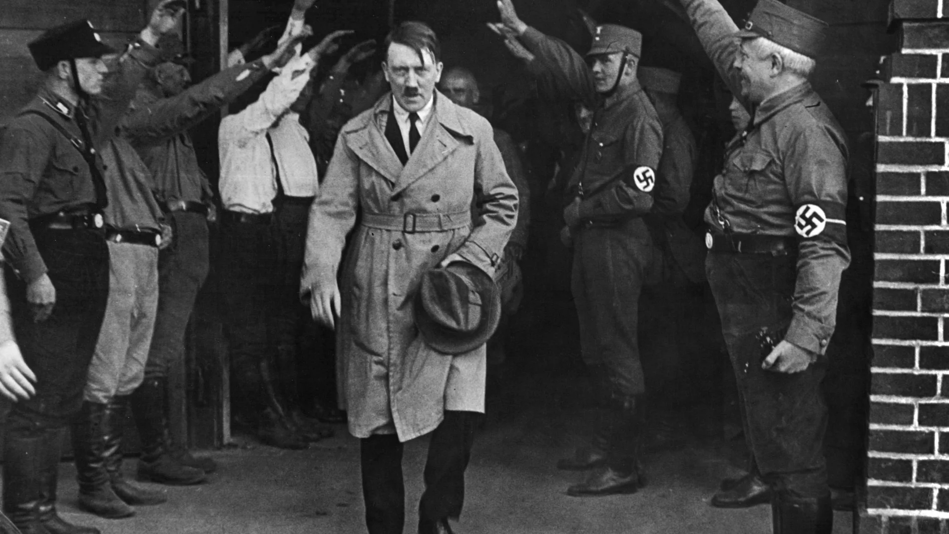 Adolf Hitler, leader of the National Socialists, leaves the party's Munich, Germany headquarters
