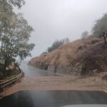 Temporal.- Bomberos del Consorcio Provincial rescatan en zodiac a un matrimonio atrapado en Cártama (Málaga)