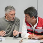 El ministro de Interior, Fernando Grande-Marlaska, y el 'president' de la Generalitat, Carlos Mazón, durante la reunión del CECOPI por la DANA en la Comunitat Valenciana.