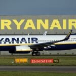 A Ryanair passenger plane stands at Stansted Airport in Essex. 