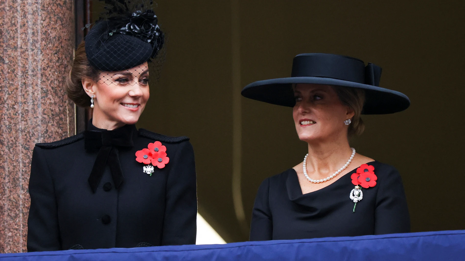 Britain's Kate, Princess of Wales, left, and Sophie, Duchess of Edinburgh, right, stand on a balcony during the National Service of Remembrance at The Cenotaph in London, England, Sunday, Nov. 10, 2024. (Toby Melville/Pool Photo via AP)