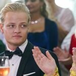 Marius Borg Hoiby (L) and Norwegian Crown Princess Mette-Marit 