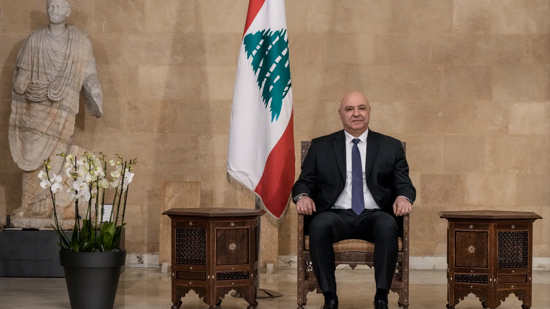Newly-elected Lebanese President Joseph Aoun sits at the presidential palace in Baabda, east of Beirut, Lebanon, Thursday, Jan. 9, 2025. (AP Photo/Bilal Hussein)