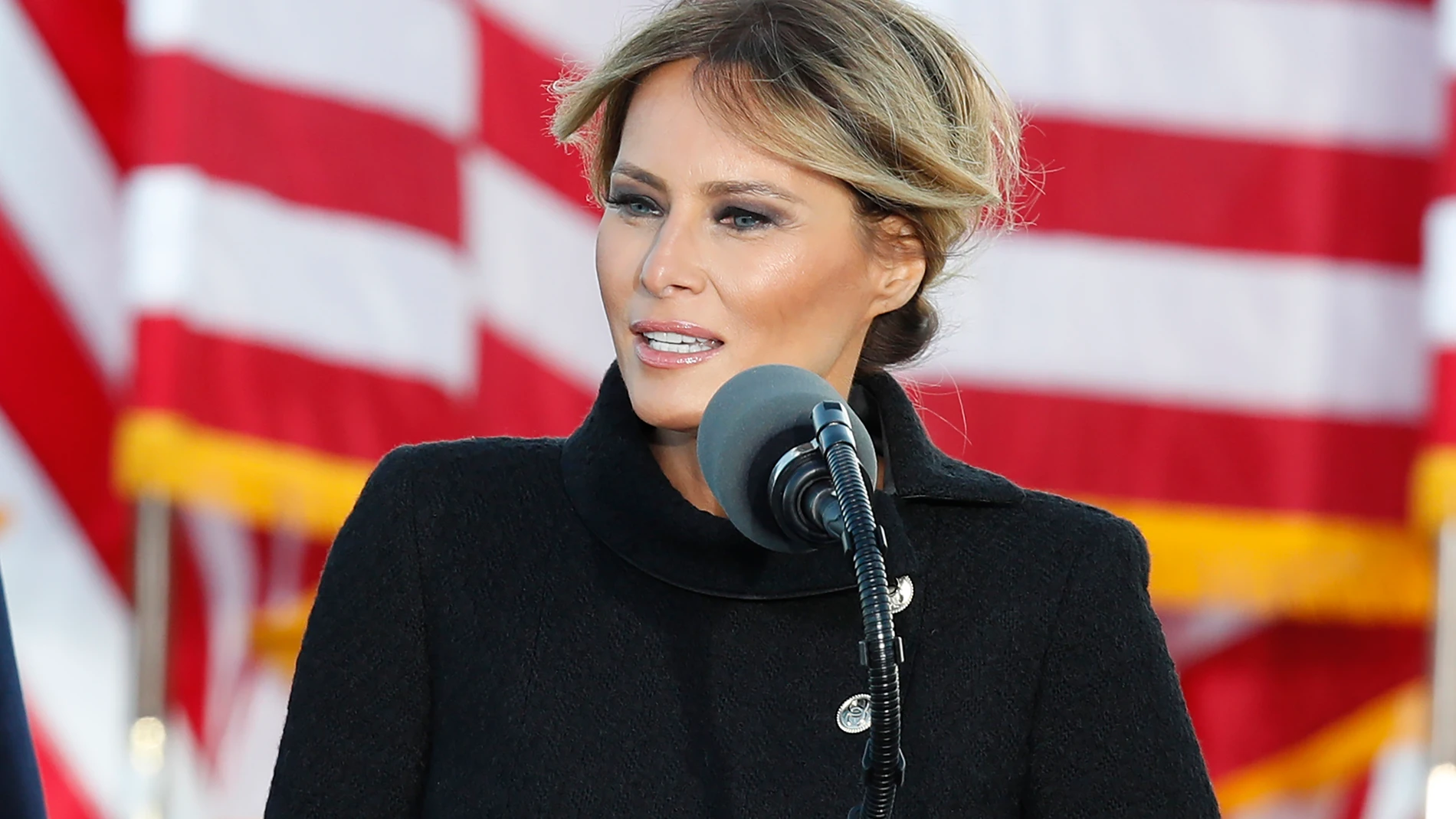FILE - First lady Melania Trump speaks to a small group of supporters at Andrews Air Force Base, Md., Jan. 20, 2021. (AP Photo/Luis M. Alvarez, File)