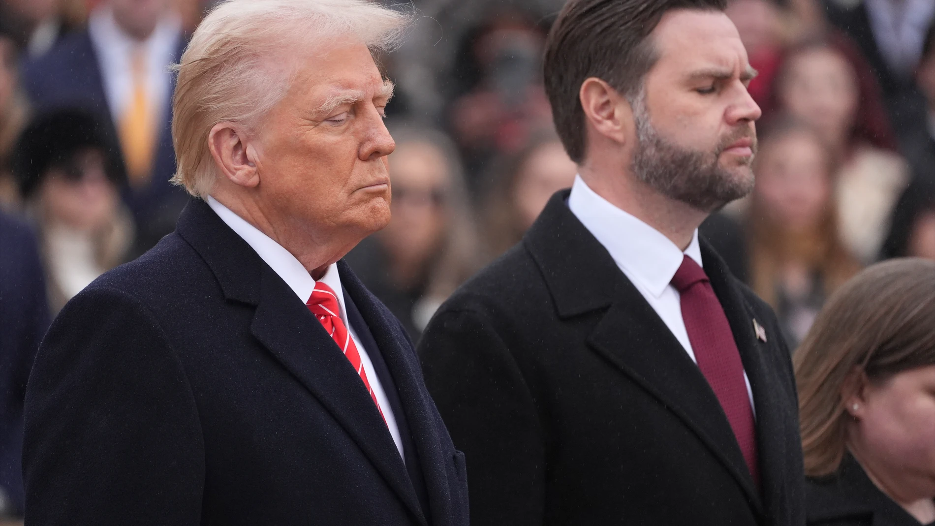 President-elect Donald Trump and Vice President-elect JD Vance participate in a wreath laying ceremony at Arlington National Cemetery, Sunday, Jan. 19, 2025, in Arlington, Va. (AP Photo/Evan Vucci)