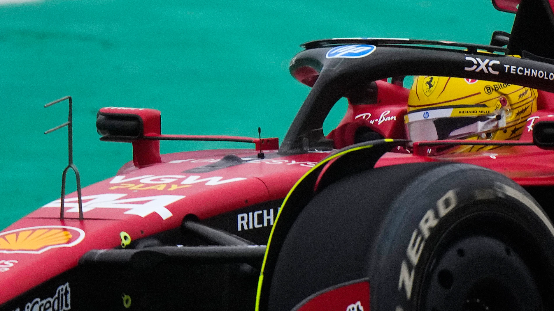 British driver Lewis Hamilton steers a Ferrari Formula One SF-23 at the Ferrari private test track, in Fiorano Modenese, Italy, Wednesday, Jan.22, 2025. (AP Photo/Luca Bruno)