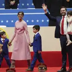 Vice President JD Vance, second right, his wife Usha Vance, second left, and their children Vivek, from left, Ewan and Mirabel arrive at an indoor Presidential Inauguration parade event in Washington, Monday, Jan. 20, 2025.