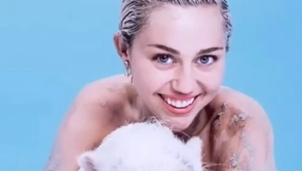 Miley Cyrus con su cerda