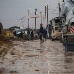 Palestinians travel through the Netzarim Corridor towards northern Gaza