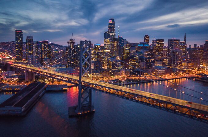 Aerial Cityscape view of San Francisco and the Bay Bridge at Night, California, USA