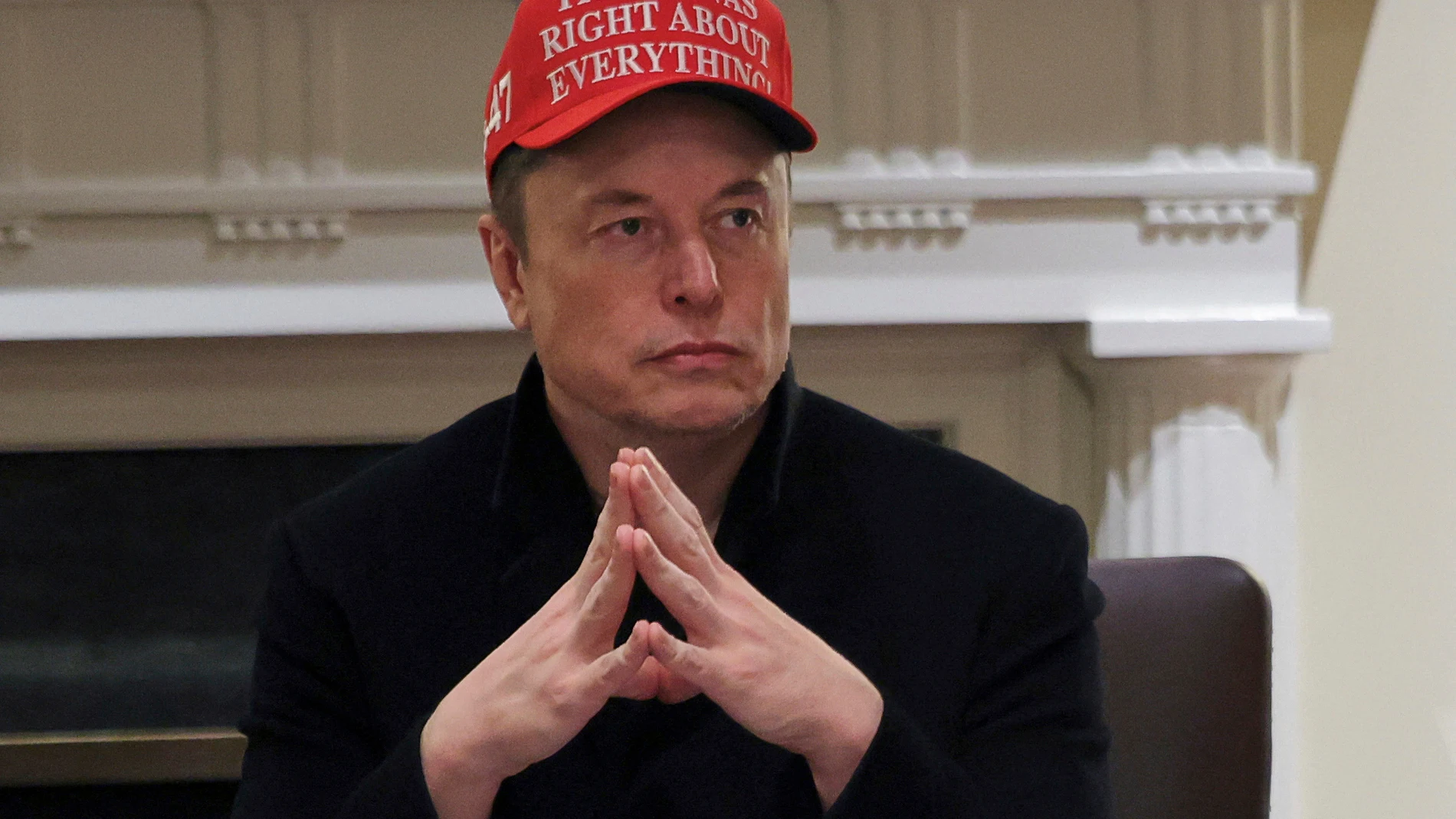 Elon Musk attends a cabinet meeting at the White House in Washington, Monday, March 24, 2025. (Pool via AP)