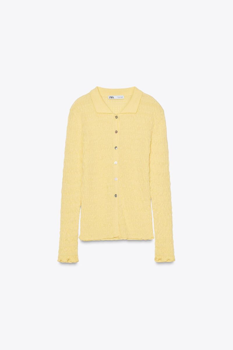 Chaqueta cuello polo punto.
