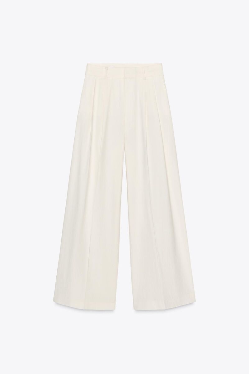Pantalón doble pliegue.