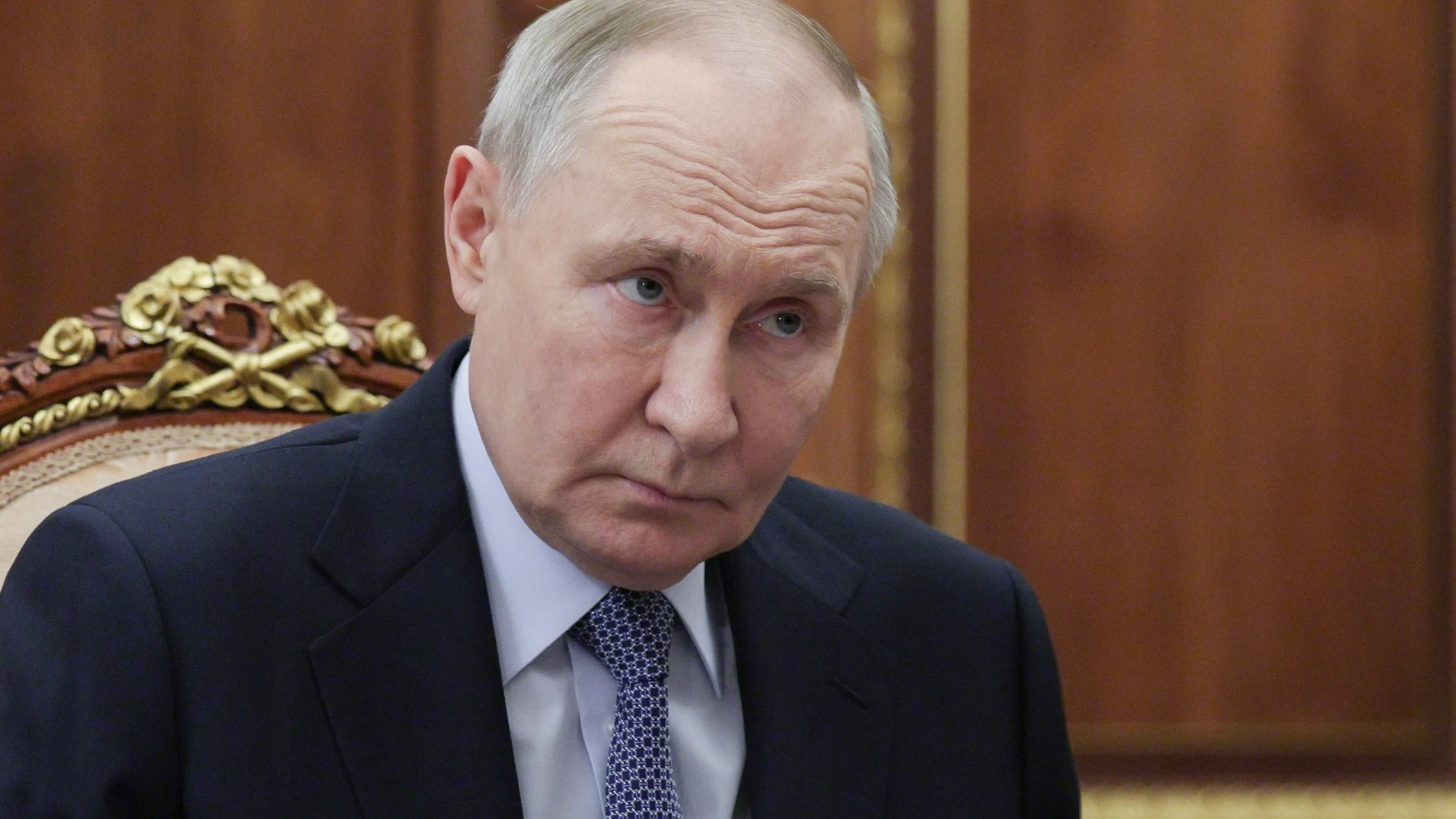 Russian President Vladimir Putin meets with Head of the Republic of Buryatia Alexei Tsydenov at the Kremlin in Moscow, Russia, Wednesday, April 2, 2025. (Vyacheslav Prokofyev, Sputnik, Kremlin Pool Photo via AP)