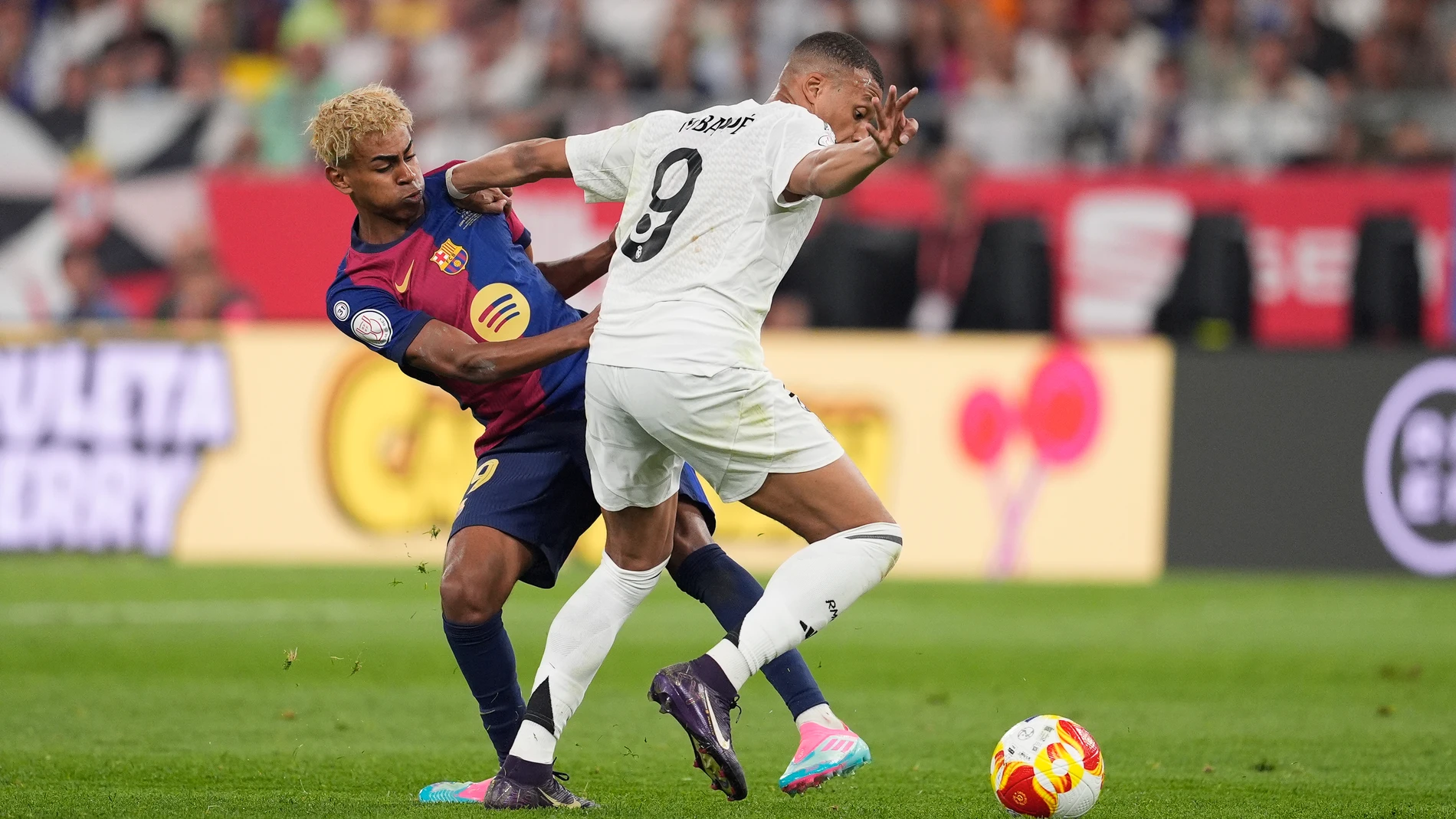 Kylian Mbappe of Real Madrid and Lamine Yamal of FC Barcelona in action during the Spanish Cup, Copa del Rey, Final football match played between FC Barcelona and Real Madrid at La Cartuja Stadium on April 26, 2025 in Sevilla, Spain.AFP7 26/04/2025 ONLY FOR USE IN SPAIN