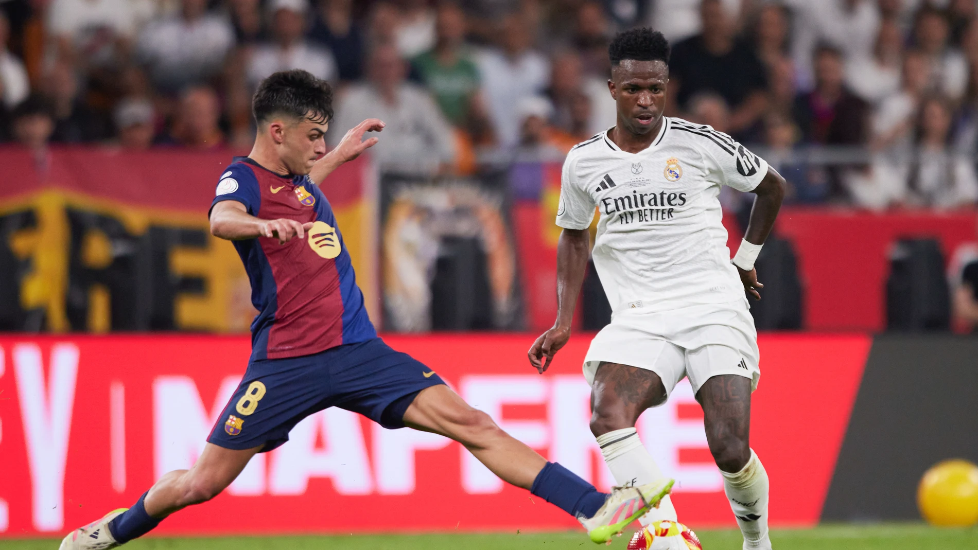 Vinicius Junior of Real Madrid and Pedri Gonzalez of FC Barcelona in action during the Spanish Cup, Copa del Rey, Final football match played between FC Barcelona and Real Madrid at La Cartuja Stadium on April 26, 2025 in Sevilla, Spain. AFP7 26/04/2025 ONLY FOR USE IN SPAIN