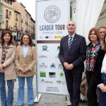 La consejera María González Corral inaugura en Segovia la epxosición 'LEADER Tour', junto a Raquel Alonso, el alcalde Jesús Mazarías y Magdalena Rodríguez, entre otros