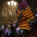 Barcelona fans celebrate in the street after their team won the Spanish La Liga soccer championship in Barcelona, Spain, Thursday, May 15, 2025. 