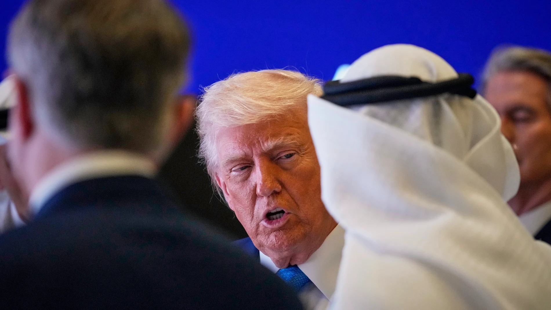 President Donald Trump attends a business meeting and roundtable at Qasr Al Watan, in Abu Dhabi, United Arab Emirates Friday, May 16, 2025.(AP Photo/Altaf Qadri)