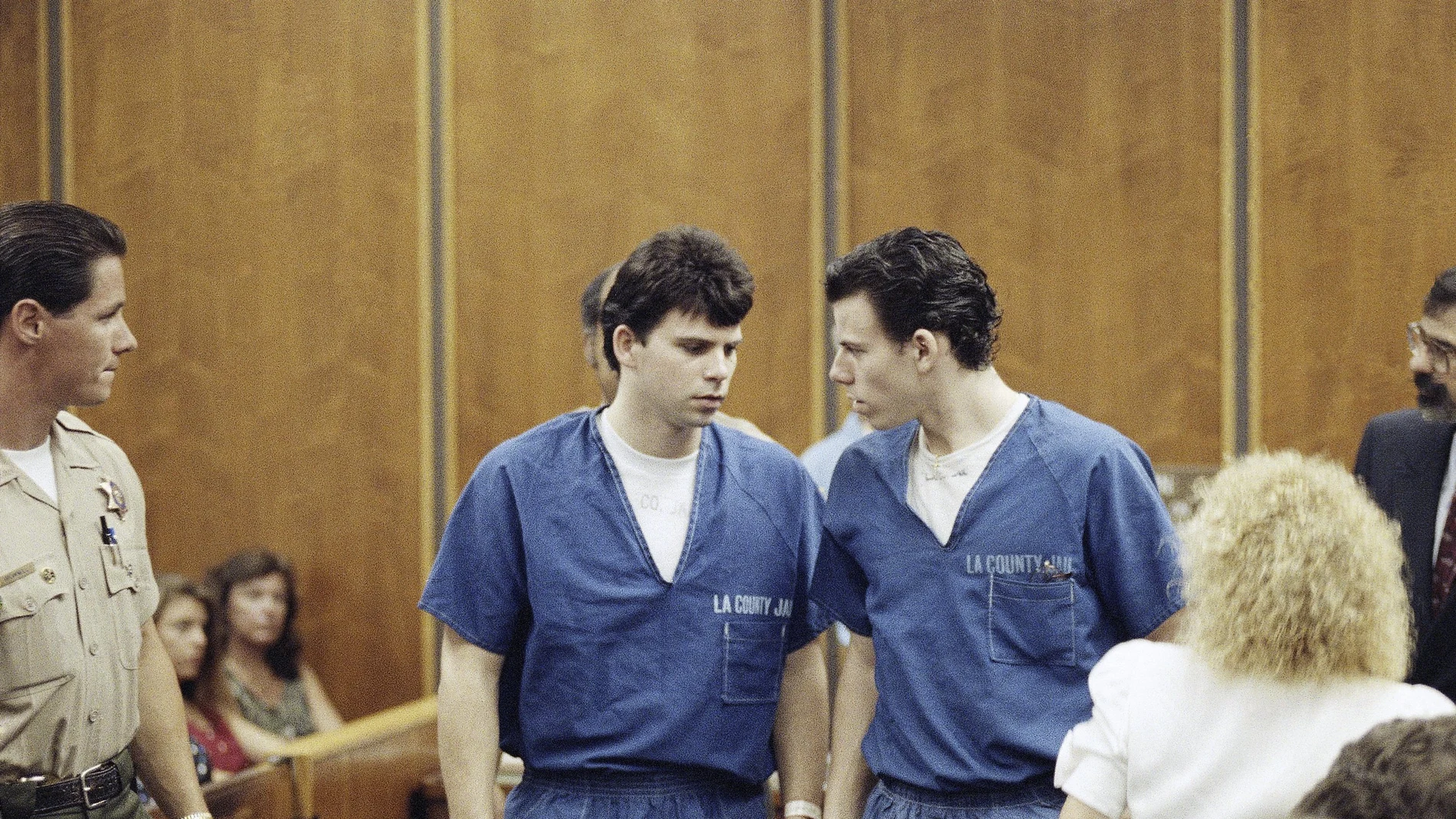 Lyle, left, and Erik Menendez leave a courtroom in Santa Monica, Calif., Aug. 6, 1990, after a judge ruled that conversations between the brothers and their psychologist after their parents were slain were not privileged and could be used as evidence.