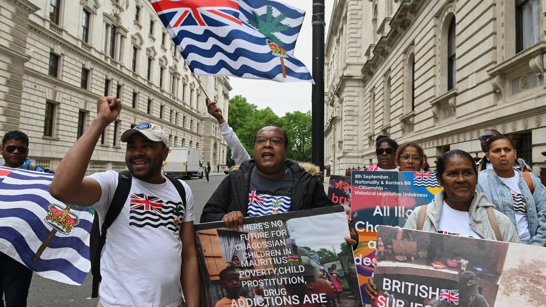 People demonstrate outside the Foreign Office in London, Thursday, May 22, 2025, after a British court blocked the U.K. from transferring sovereignty over the Chagos Islands to Mauritius hours before the agreement was due to be signed. (AP Photo/Thomas Krych)