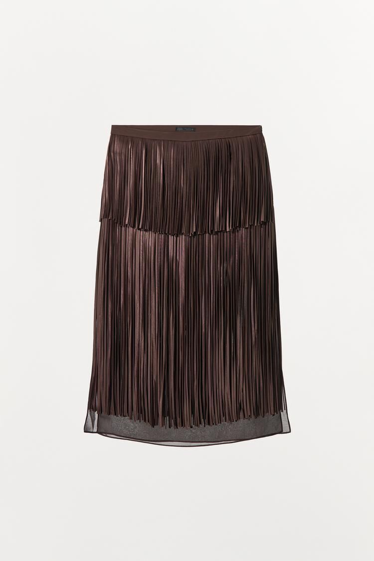 Falda midi flecos.
