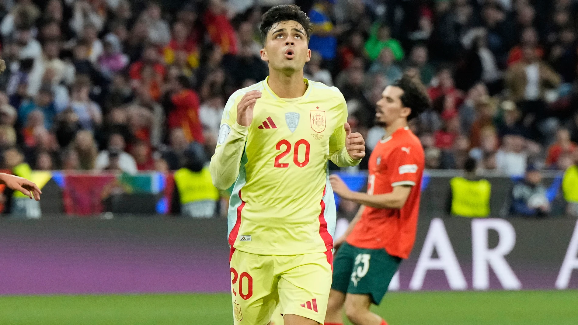 Spain's Pedri reacts after missing a chance to score during the Nations League final soccer match between Portugal and Spain at the Allianz Arena in Munich, Germany, Sunday, June 8, 2025. (AP Photo/Martin Meissner)