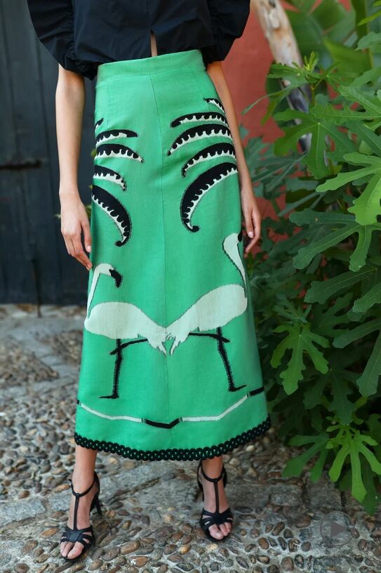 Falda verde.