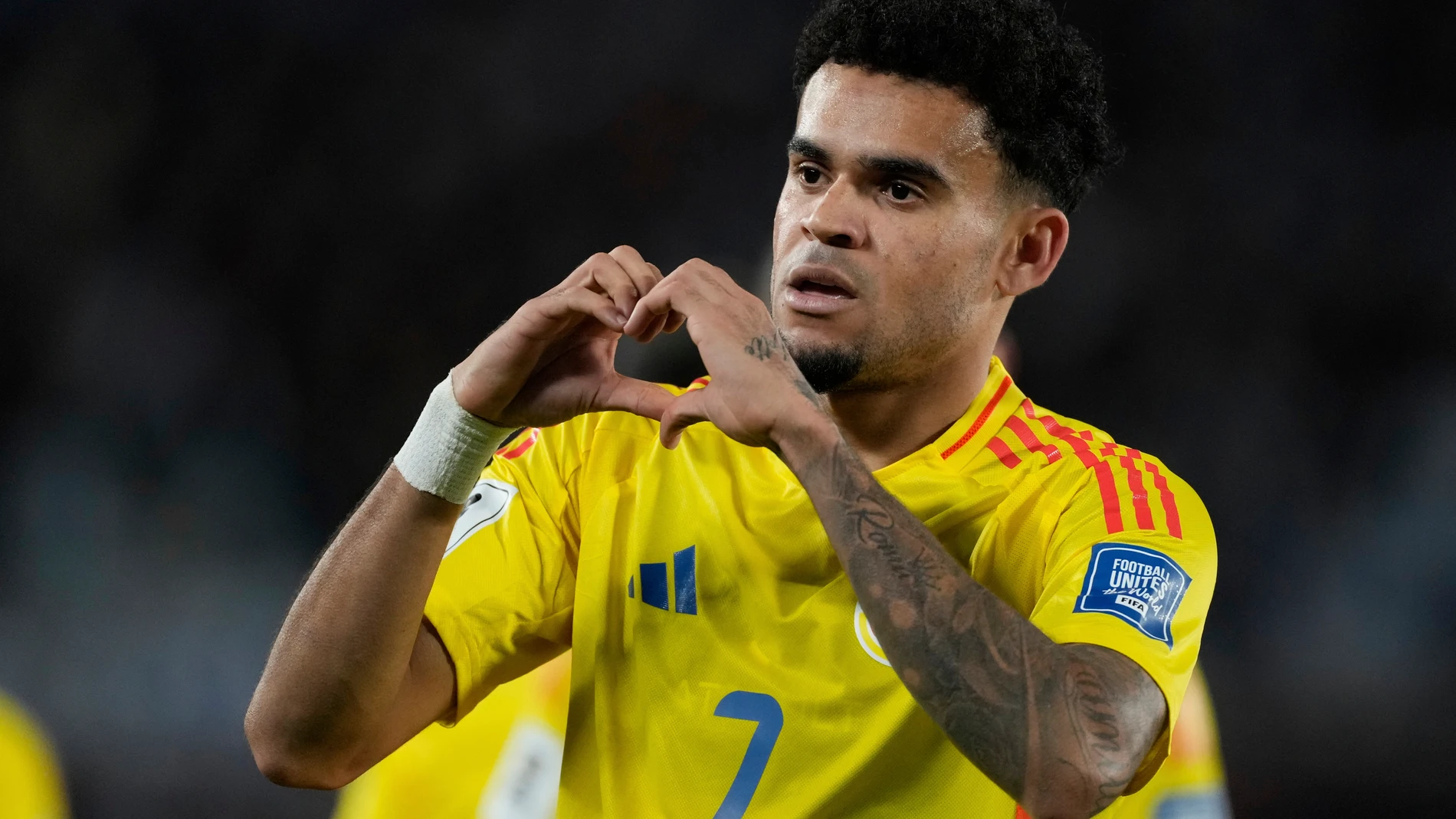 Colombia's Luis Diaz celebrates scoring his side's opening goal against Argentina during a qualifying soccer match for the FIFA World Cup 2026 at the Monumental stadium in Buenos Aires, Argentina, Tuesday, June 10, 2025. (AP Photo/Gustavo Garello)