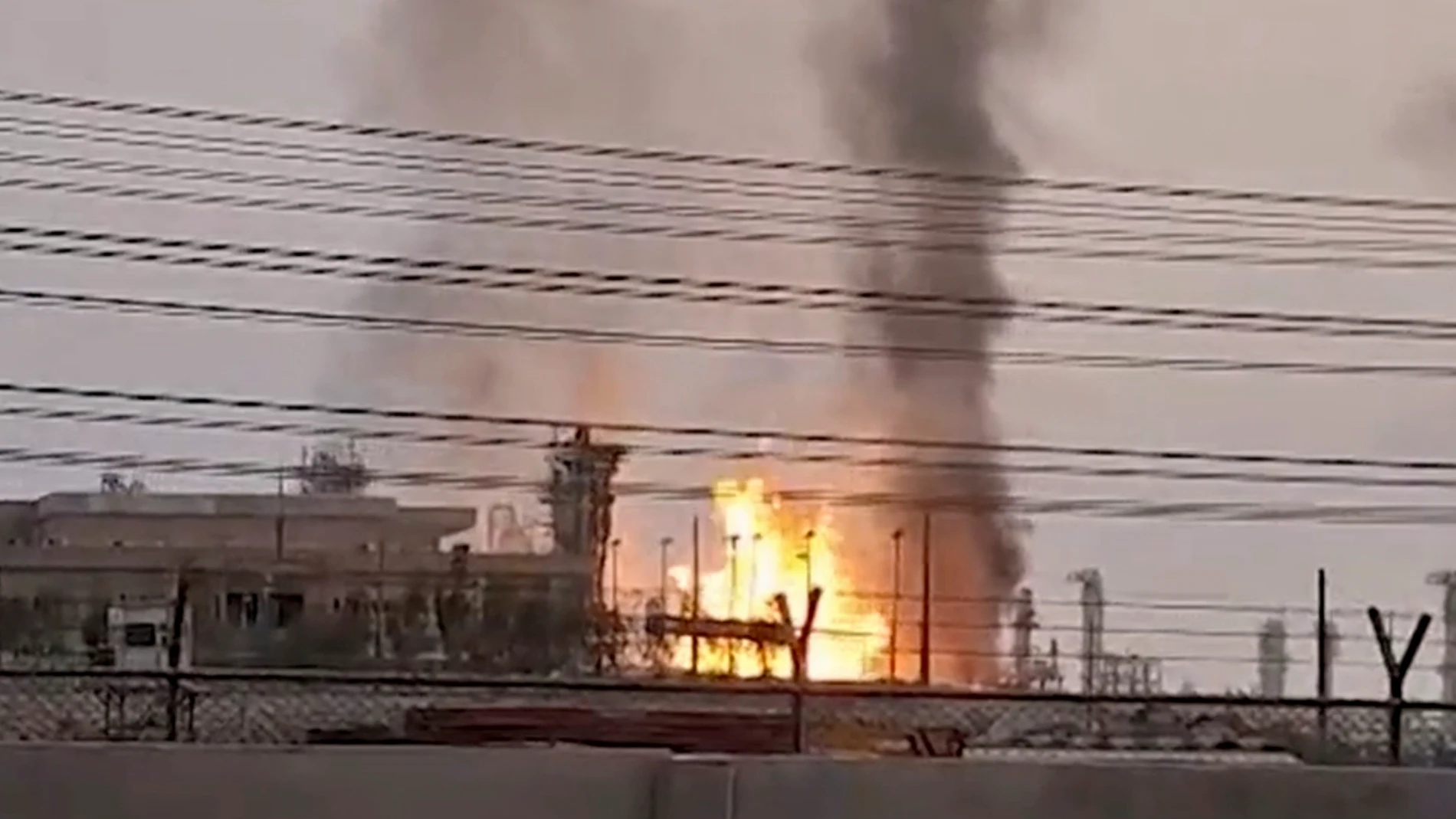 This frame grab taken from Islamic Republic of Iran Broadcasting (IRIB) shows a refinery in Iran's South Pars gas field after it was struck by an Israeli drone in Kangan, in Iran's Bushehr province, Saturday, June 14, 2025. (IRIB via AP)