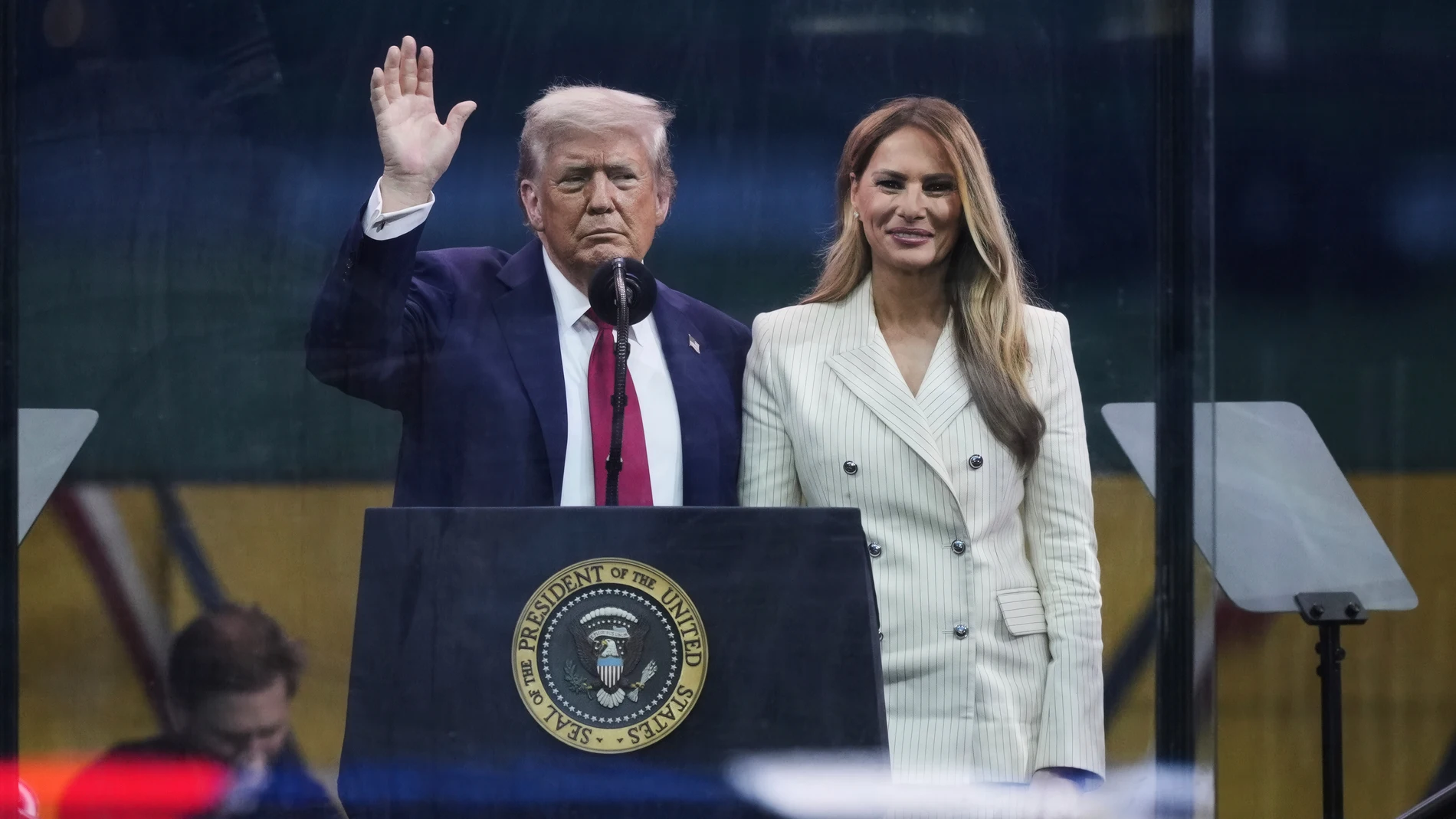 President Donald Trump and first lady Melania Trump attend a military parade commemorating the Army's 250th anniversary, coinciding with his 79th birthday, Saturday, June 14, 2025, in Washington. (AP Photo/Julia Demaree Nikhinson)
