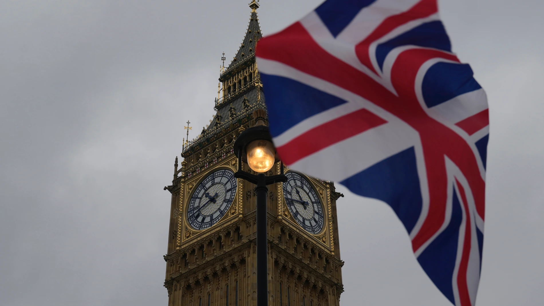 FILE - A Union flag is displayed outside the Houses of Parliament, in London, Thursday, May 23, 2024.(AP Photo/Kin Cheung, File)