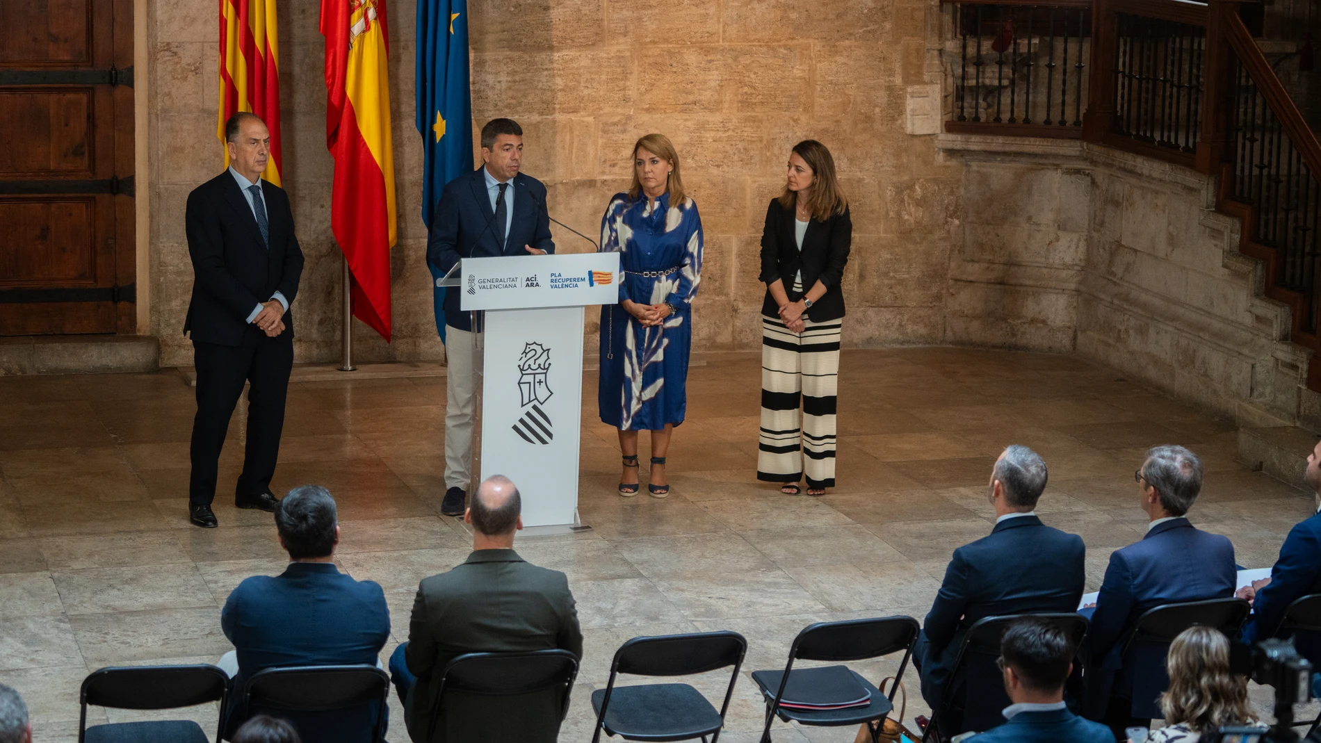 (I-D) El Conseller de Emergencias e Interior, Juan Carlos Valderrama Zurián, el president de la Generalitat, Carlos Mazón, la Vicepresidenta Primera y consellera de Servicios Sociales, Igualdad y Vivienda y portavoz del Consell, Susana Camarero, y la consellera de Justicia y Administración Pública, Nuria Martínez Sanchis, ofrecen declaraciones tras asistir a la presentación del plan integral contra la ocupación de viviendas, en el Palau de la Generalitat, a 19 de junio de 2025, en Valencia, C...