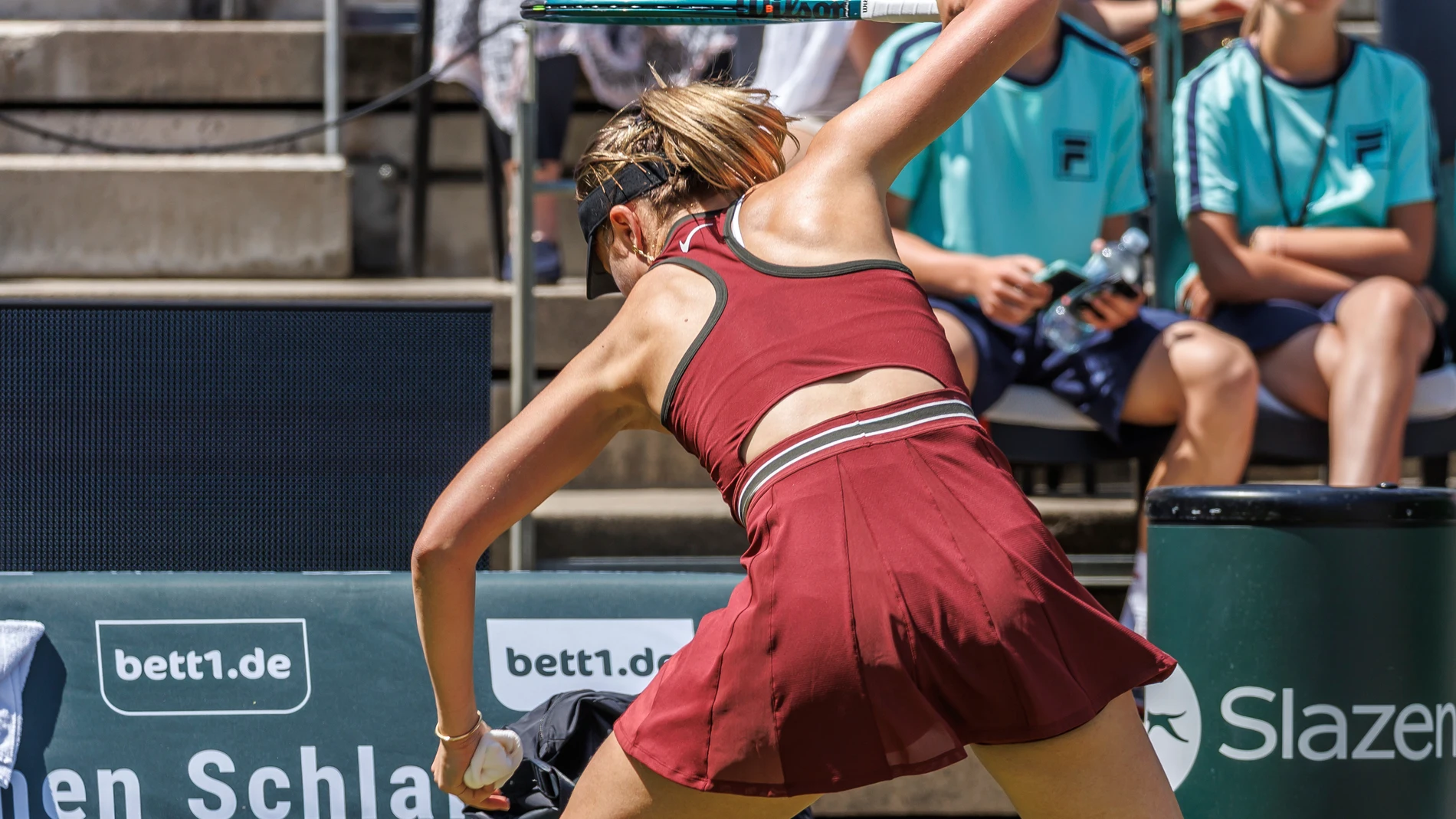 Spain's Paula Badosa hits her racquet on the ground during her women's singles quarter final tennis match against China's Xinyu Wang during the WTA Tour in Berlin, Friday, June 20, 2025. (Andreas Gora/dpa via AP)