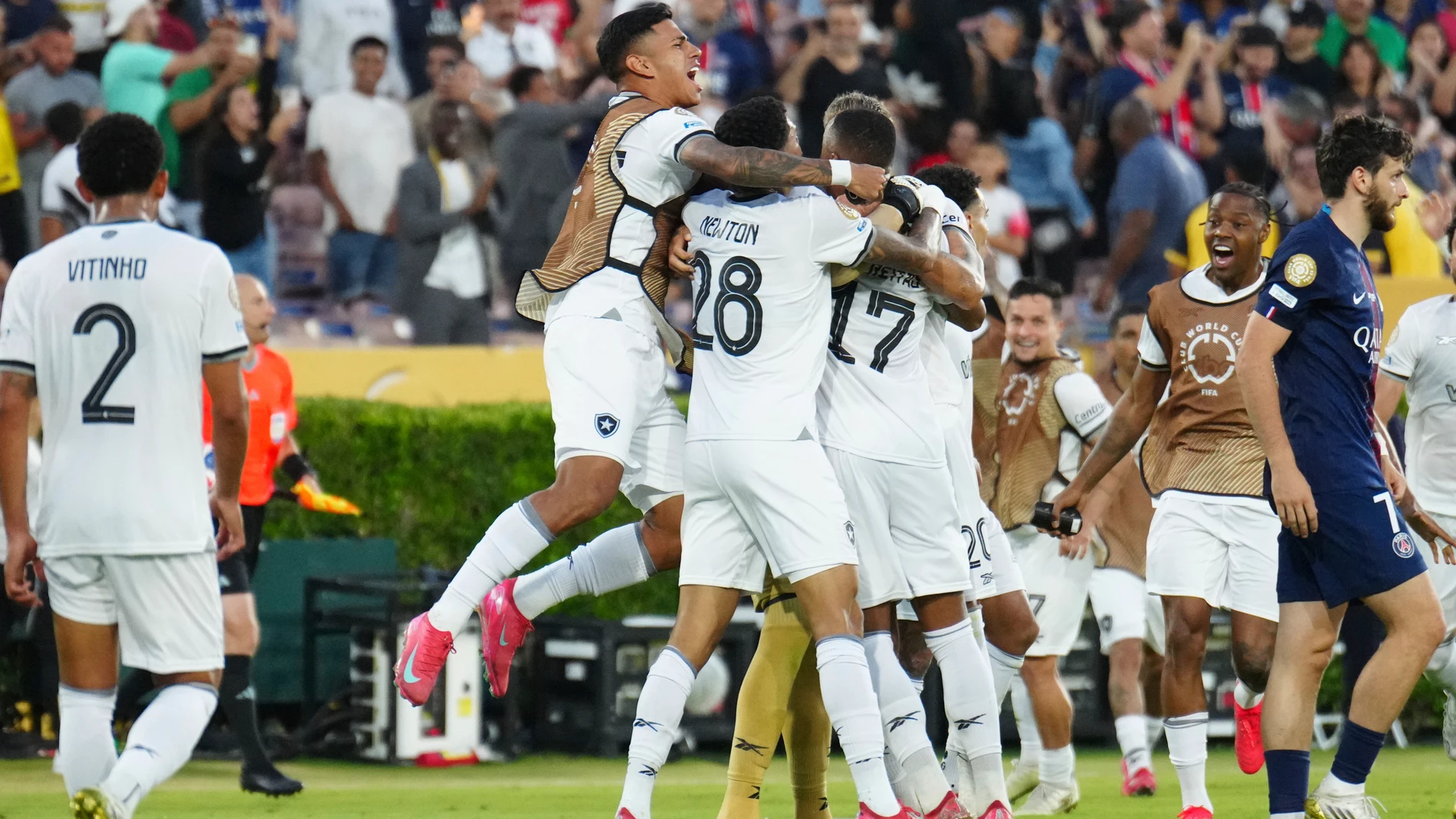 Botafogo players celebrate after winning the Club World Cup group B soccer match between PSG and Botafogo in Pasadena, Calif., Thursday, June 19, 2025. (AP Photo/Jae C. Hong)